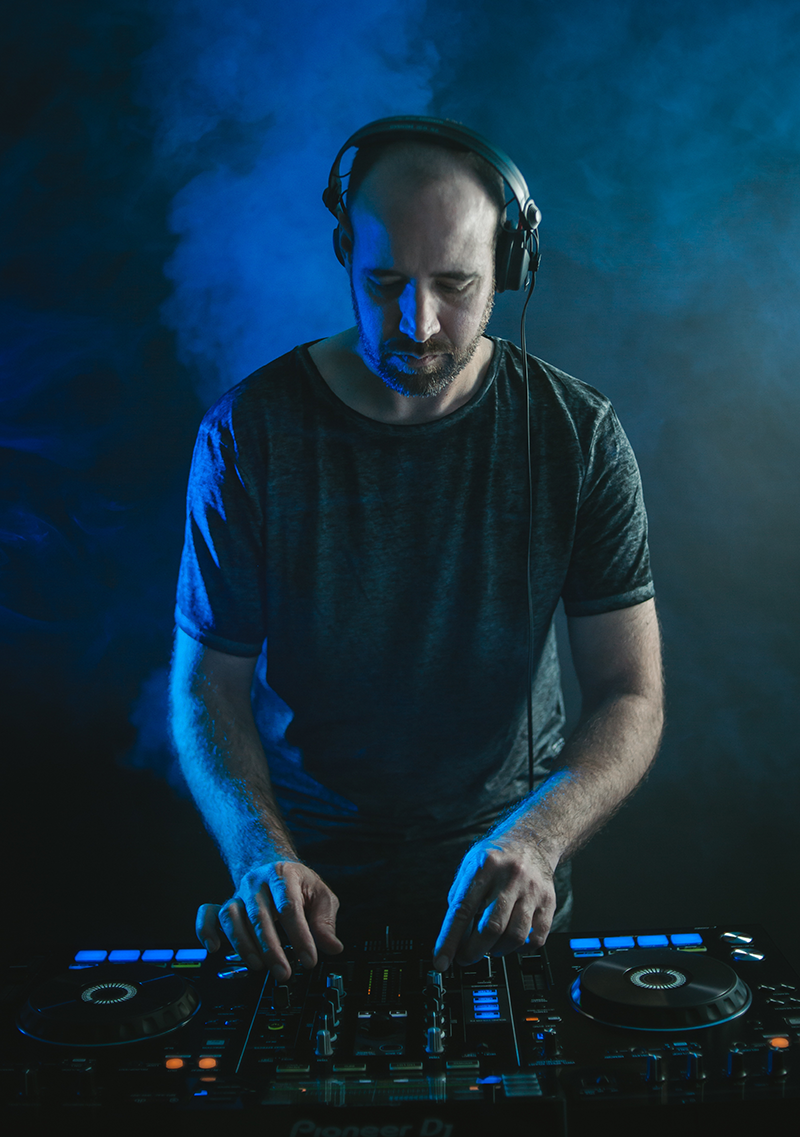DJ at his DJ Controller